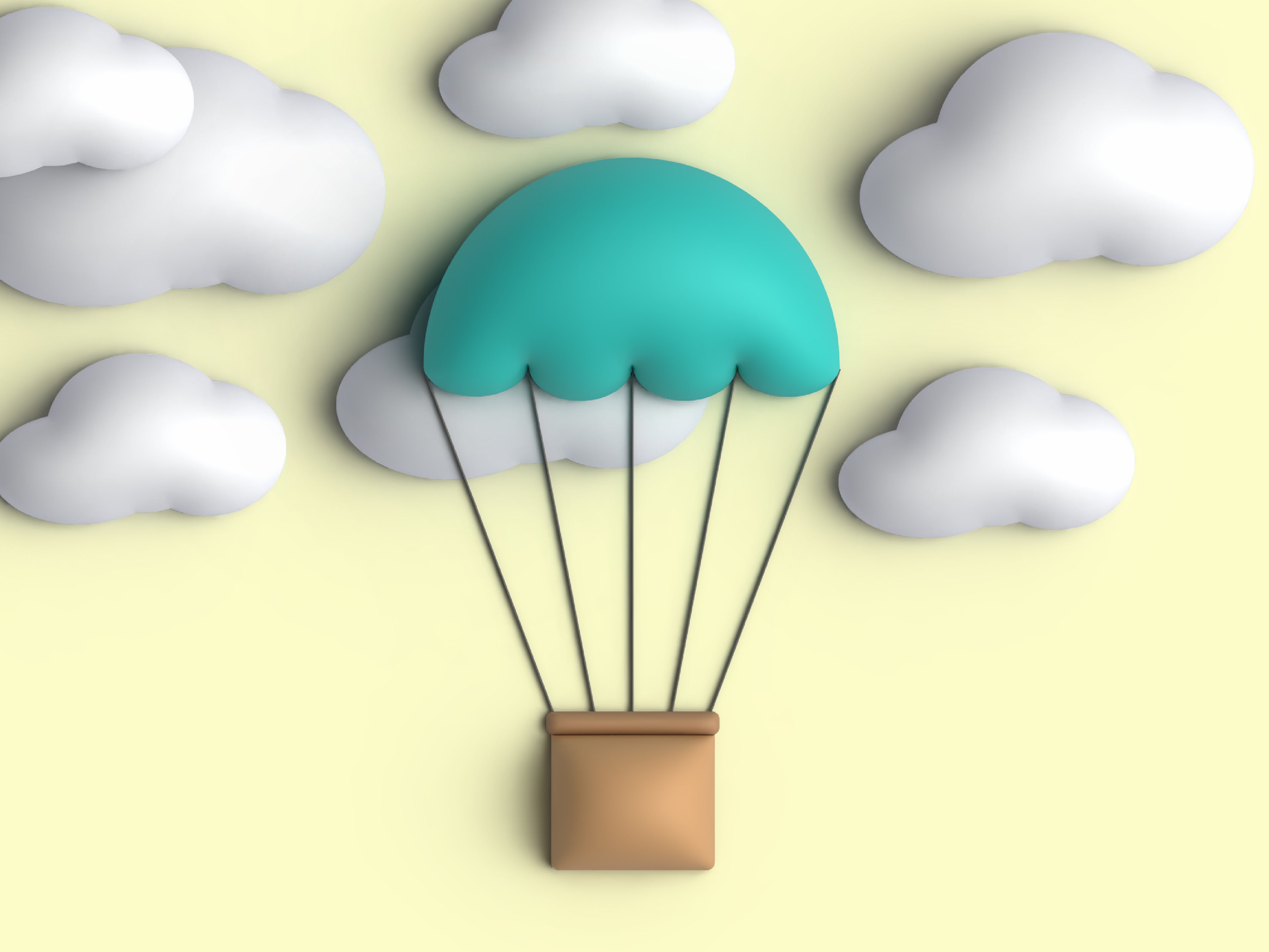 Air ballon up in the sky with clouds in the background.