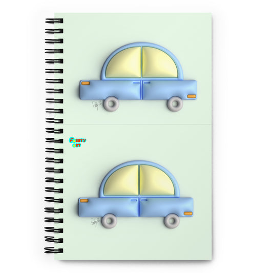 Blue car in green spiral notebook