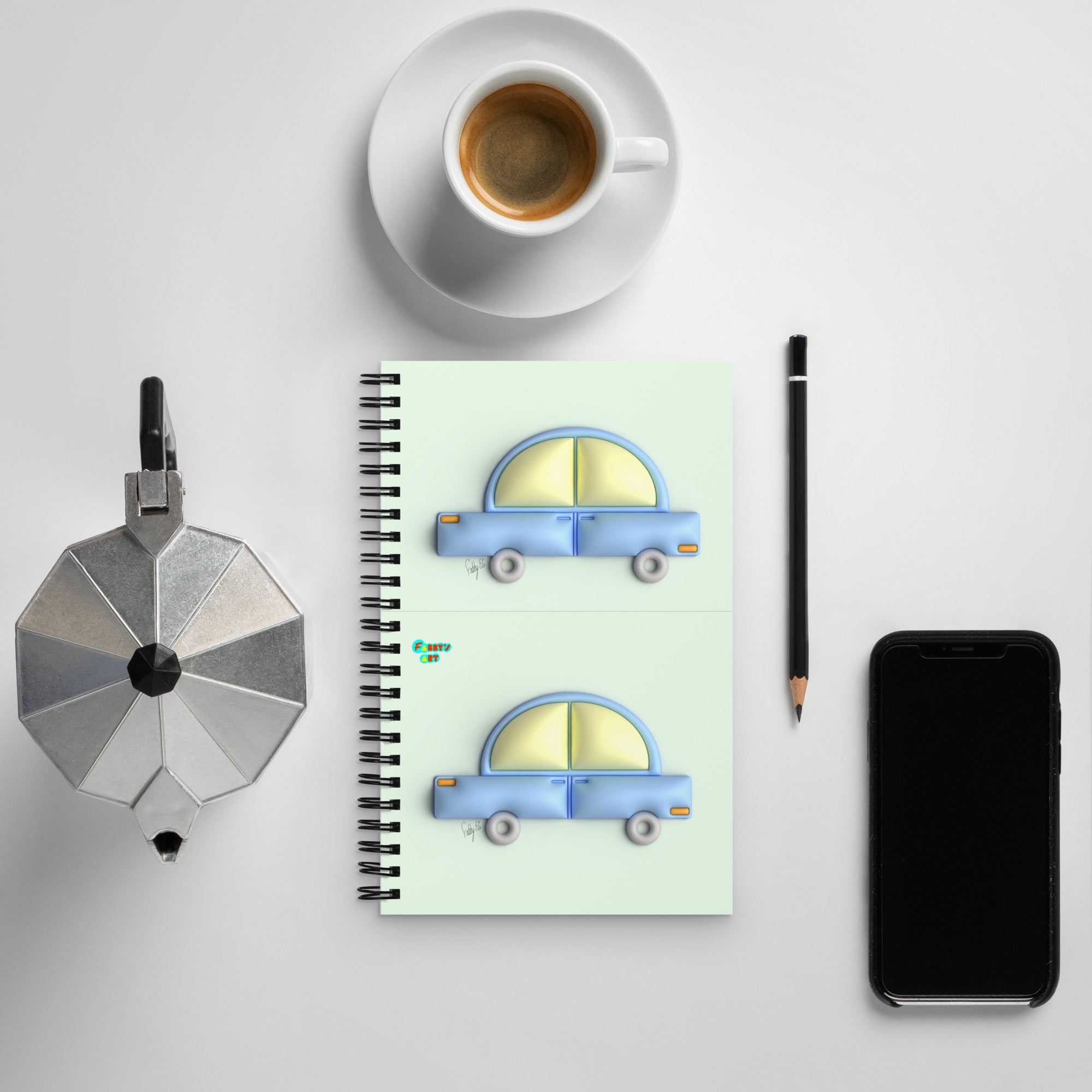 Blue car in green spiral notebook