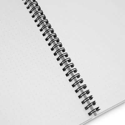 Blue car in green spiral notebook